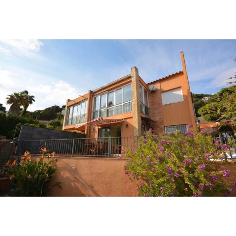 4 bedrooms house with sea view enclosed garden and wifi at Lloret de Mar 1 km away from the beach