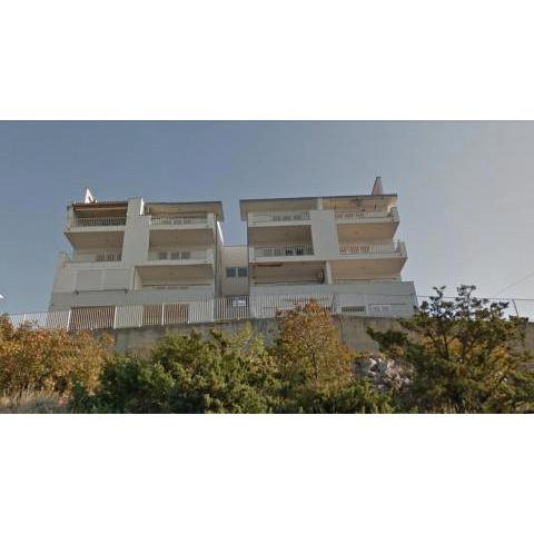 Apartments with a parking space Senj - 15236