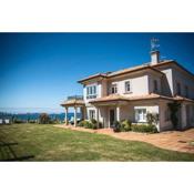 Chalet Pareado con Jardin en 1ª Linea de Mar