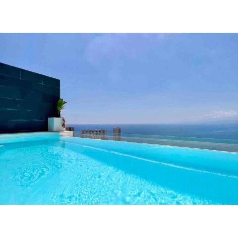 Faro Cullera. Villa pareada. Infinity pool .