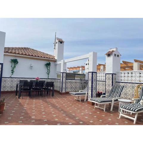 Holiday home with large roof terrace near La Mata beach