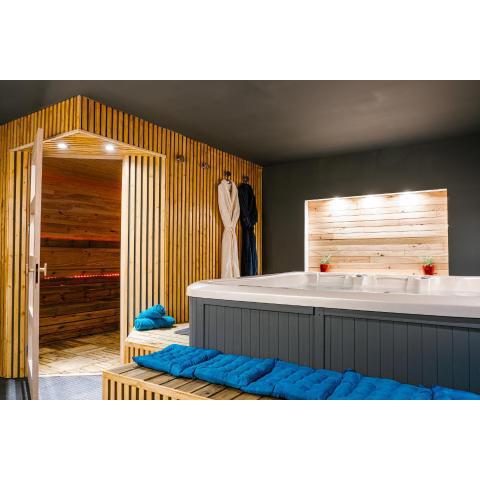 L'alcôve du 510 - Spa - chambre romantique - sauna - salle de jeux