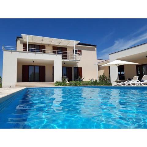 Villa Dora kids friendly with private pool and playground for 10 persons