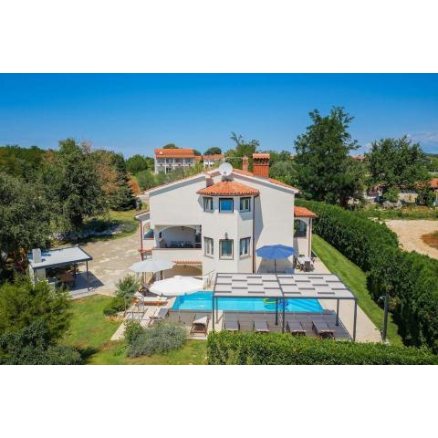 Villa Eufemia with large garden and outdoor playground for kids